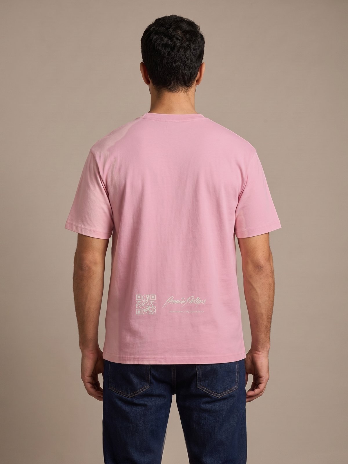 Back of the pink tee with the verification mark